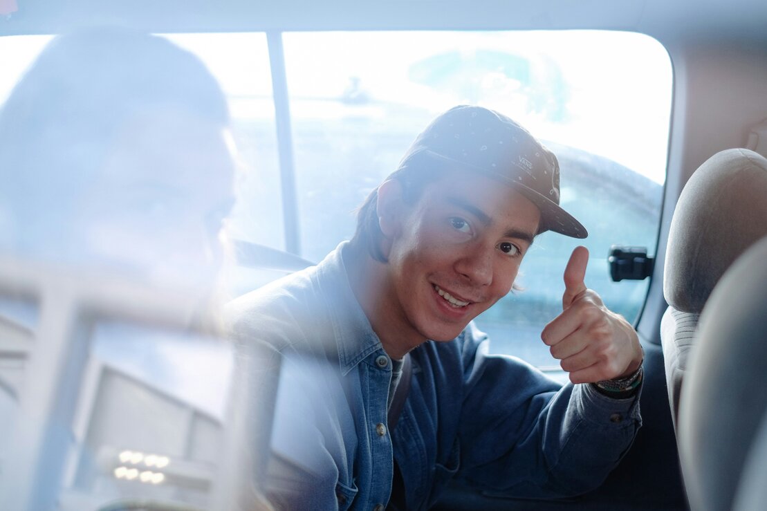 Happy driver getting approved for auto financing