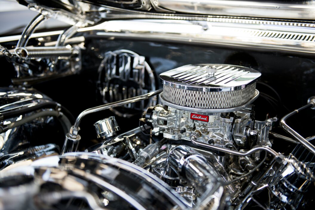 Spark plugs and tools prepared for a basic tune-up